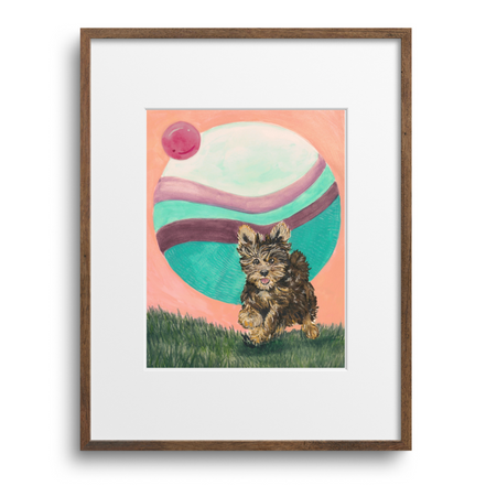 Framed artwork of a cat with a colorful balloon in the background on a white wall.