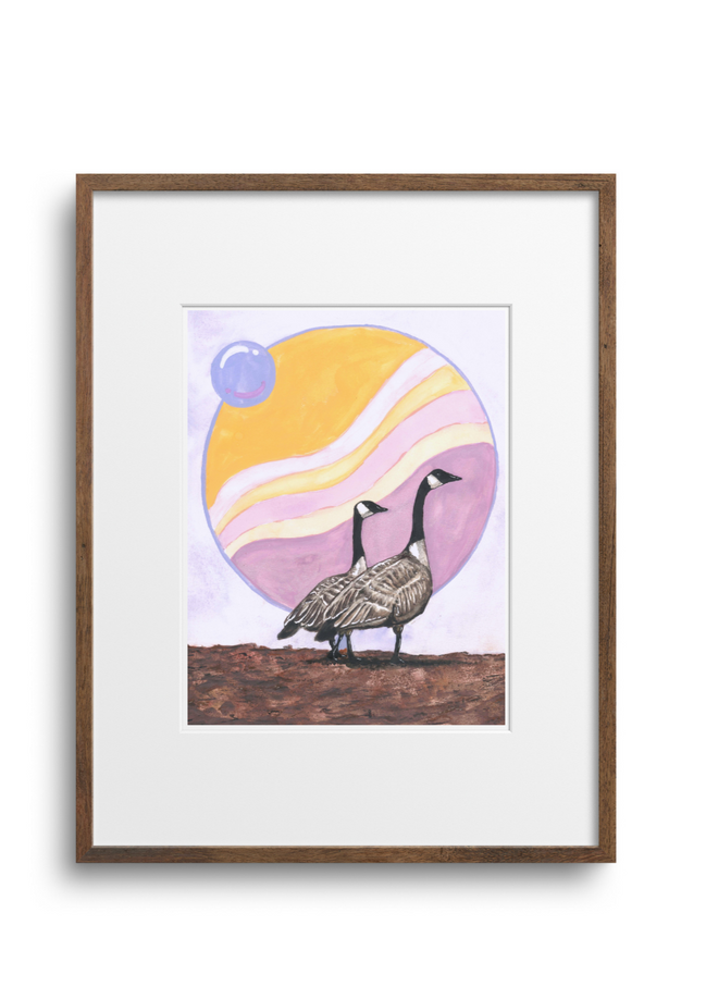 Framed artwork of two birds on a hill with a colorful sky.
